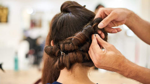 Could you tell me whether this haircut scissors are used flat or vertical?