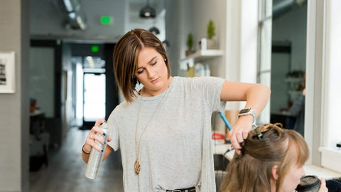 What does a barber assistant do?
