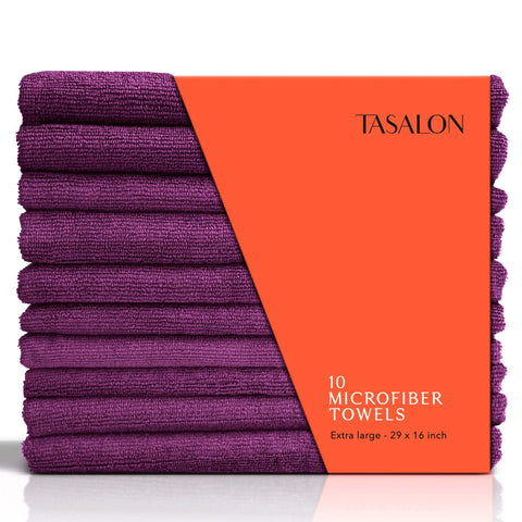 A stack of purple microfiber hair towels with a label showing the product name and quantity, 10 microfiber towels.