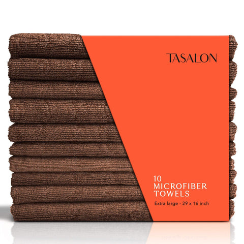 A stack of brown microfiber hair towels with a label showing the product name and quantity, 10 microfiber towels.
