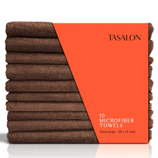 A stack of brown microfiber hair towels with a label showing the product name and quantity, 10 microfiber towels