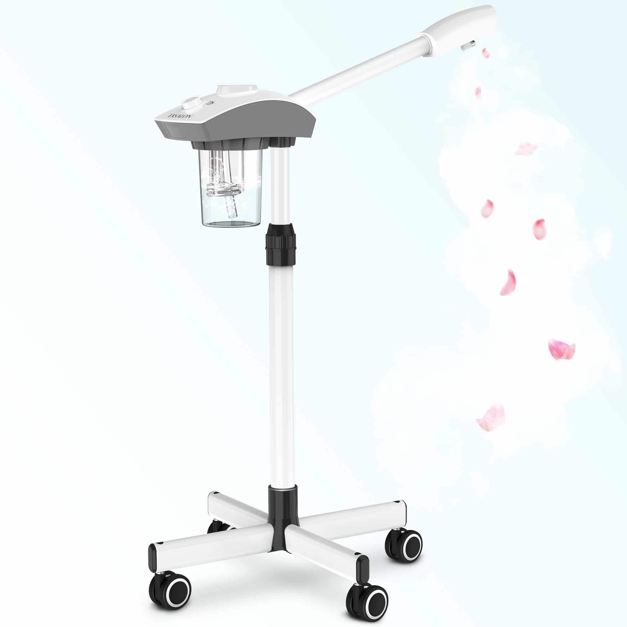 A professional facial steamer machine on a wheeled stand, primarily white with black accents, emitting steam.